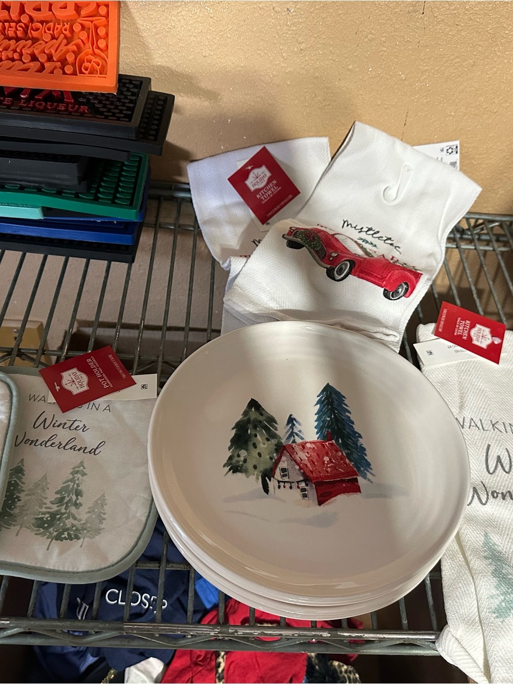 Cost Plus World Market White Ceramic Plate with Black Logo